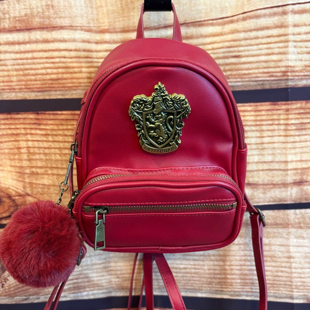 Harry Potter Universal Exclusive Gryffindor Burgandy Mini Backpack Pom NWOT